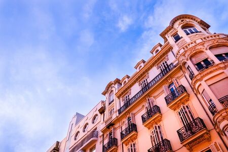 High ancient buildings in the center of the city of Valencia, at sunset, in Spain.の写真素材
