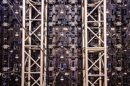 Valencia, Spain - November 17, 2019: Led panel of a giant screen seen from behind, of the Alfalite brand, with dozens of complicated electronic connections.のeditorial素材
