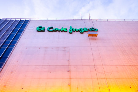 Valencia, Spain - November 14, 2019: A hanged operator cleans the facade of the department stores of El Corte InglÃ©s, in Valencia.のeditorial素材