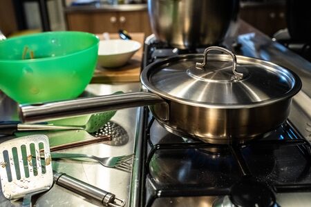 Metal pot in a restaurant kitchen.の写真素材