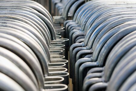 Metal pipes of portable barriers, close-up of smooth material.の写真素材