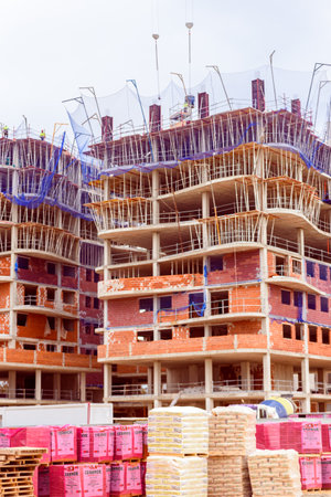 Valencia, Spain - December 20, 2019: Construction of residential buildings on the outskirts of the...
