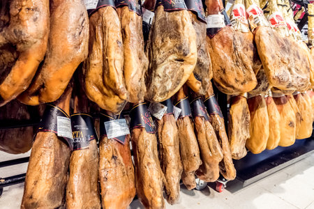 Valencia, Spain - December 20, 2019: At Christmas, Serrano ham is one of the luxuries that Spaniards...