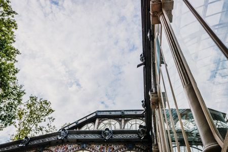 Reflections in the crystals of the richly ornate windows of the Crystal Palace in Madrid.のeditorial素材