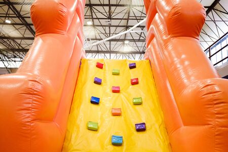 Inflatable castle to bounce and jump, with steps to climb.の写真素材