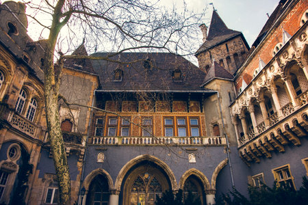 Budapest, Hungary - April 2, 2013: Vajdahunyad Castle and Jaki Chapel, historical attraction for tourists.のeditorial素材