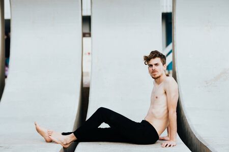 Portrait of a young redhead practicing yoga.