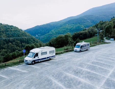 Aragon, Spain - August 2, 2019: Aerial view of a motorhome park in a mountain area for adventure tourists.のeditorial素材