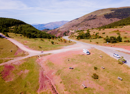 Aragon, Spain - August 2, 2019: Aerial view of a motorhome park in a mountain area for adventure tourists.のeditorial素材
