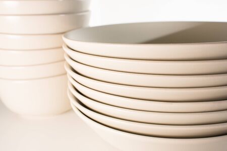 Group of empty and clean brown dishes and bowls.の写真素材