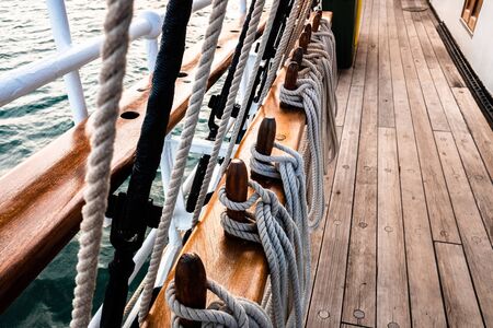 Boat mooring ropes wound on a sailboat.