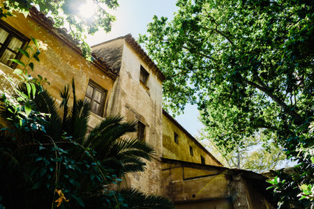 Old ruined mansion in Italian style with glimpses of the sun.のeditorial素材
