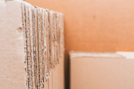 Detail of some folded cardboard boxes to make a move of home.の写真素材