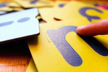 Stack of colored letters to learn the alphabet and letters and develop linguistic skills in a montessori school.の写真素材