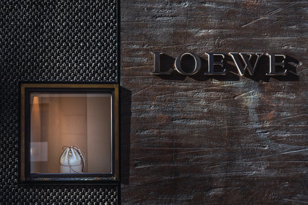 Valencia, Spain - August 20, 2020: Facade of the Loewe store with its stone logo, a store...