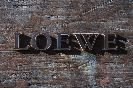 Valencia, Spain - August 20, 2020: Facade of the Loewe store with its stone logo, a store specializing in luxury handbags and accessories.のeditorial素材