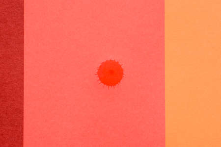 Water drop stain staining a colored paper.
