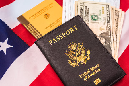 Valencia, Spain - September 6, 2020: American travelers must present their vaccination card along with their passport when traveling abroad.のeditorial素材