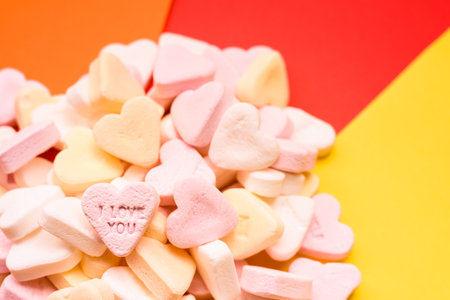Love wishes and I Love You messages engraved on a sweet heart-shaped candy.の写真素材
