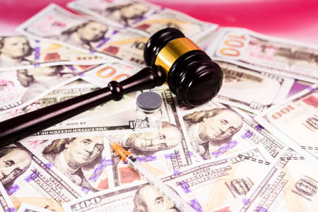 Drug use in the United States is punishable by justice and with purposes of many dollars.の写真素材