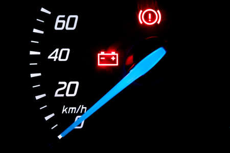 Speedometer in kilometers hour of a combustion car on the dashboard.