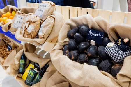 Madrid, Spain - May 20, 2021: Sample of natural products of Spanish cultivation, such as Avocados,...