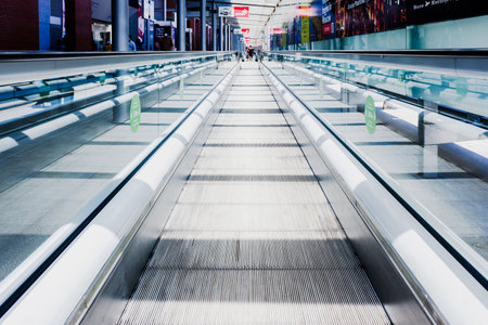 Madrid, Spain - May 20, 2021: Flat scalator mechanical walkway to speed up the pedestrian crossing in an Ifema pavilion.のeditorial素材