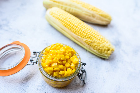 Glass jar with high quality organic sweet corn kernels for gourmets.