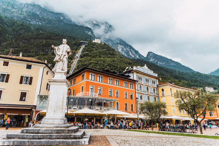 Riva del Garda, Italy - September 22, 2021: Colorful streets of the beautiful Italian town of Riva at the foot of the mountains and on Lake Gardaのeditorial素材