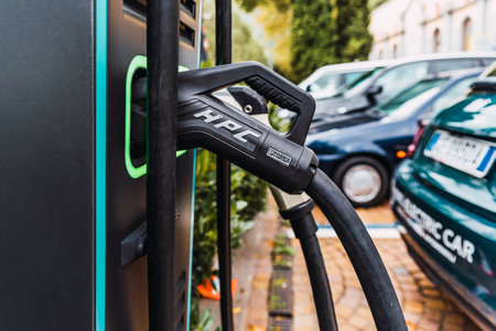Rome, Italy - September 24, 2021: Public electric vehicle charging pole installed in a central street.のeditorial素材