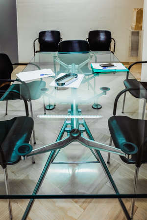 Empty transparent glass table in a meeting room.の写真素材