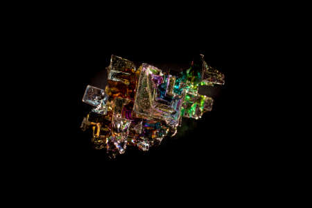 A piece of the pure metal recrystallized Bismuth, one of the commodities and rare metals used in industry.の写真素材