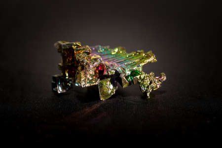 A piece of the pure metal recrystallized Bismuth, one of the commodities and rare metals used in...