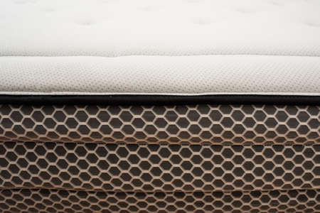 Detail of the spongy material of the upper fabric of a mattress for comfortable sleeping.の写真素材