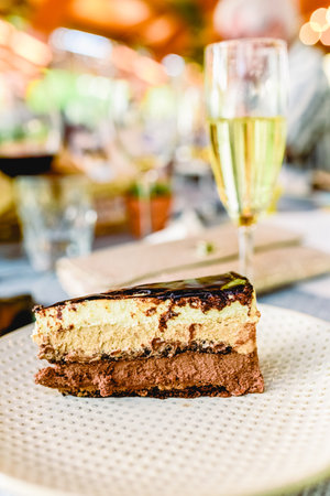 Exquisite dessert is an elegant and luxurious cake refinedly presented at a celebration.の写真素材