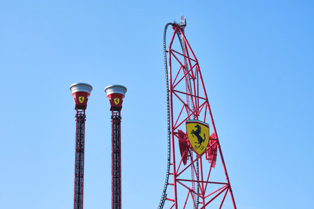 Salou, spain - May 20, 2022: Roller coaster sponsored by the Ferrari car factory, with the shield of its logo fixed to the platform.のeditorial素材