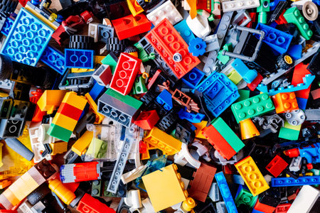 Valencia, spain - february 9, 2022: messy Lego pieces on the floor, detail.のeditorial素材
