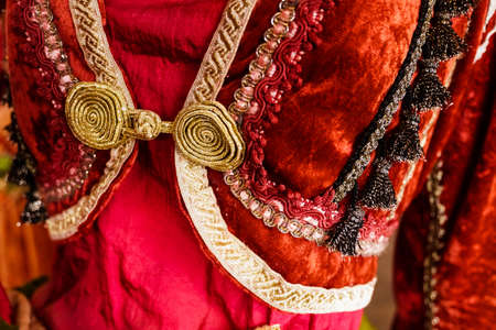 Details and textures of the fabric of a traditional Greek dress.の写真素材