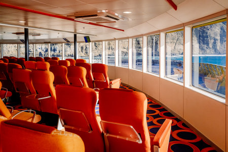 Empty seats inside a maritime ferry for passengers, before sailing.
