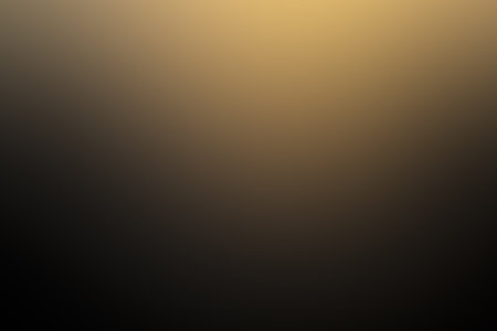Dark gradient background of yellow tones.の写真素材