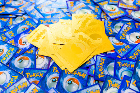 Valencia, Spain - January 10, 2023: Logo of a pokemon trading card game, golden and special rare