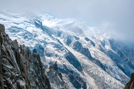 Spectacular mountain crags between glaciers in the alps.の写真素材