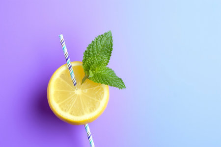 Refreshing natural lemon drink with straw.の素材