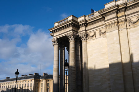 Side facade of a neoclassical building in Paris, Pantheon, a bluish sunny day.の素材