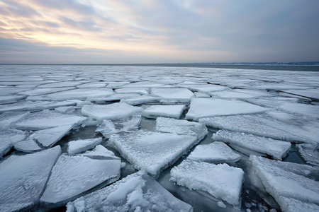 The ice accumulated on the lake has begun to break into pieces.の素材
