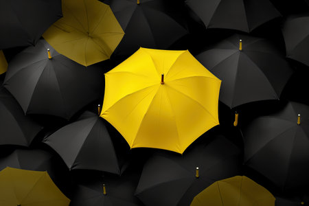 A yellow umbrella stands out from the ordinary crowd. Concept of standing out among many.の素材