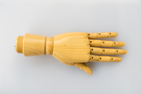 wooden hand on white backgroundの写真素材