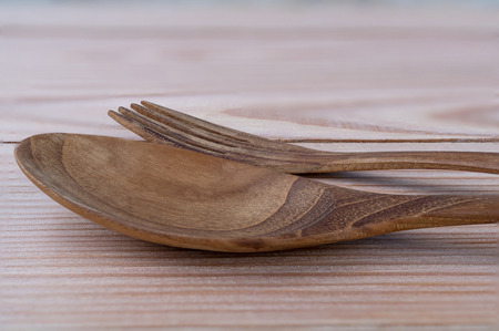 Wooden Kitchenware on wood backgroundの写真素材