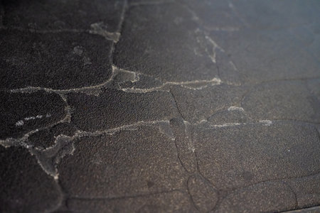 Tile in corner of toilet has dirty stains, Floor tiles have mold.の写真素材