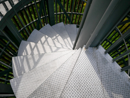 Top view silver color lighthouse spiral staircase.の写真素材
